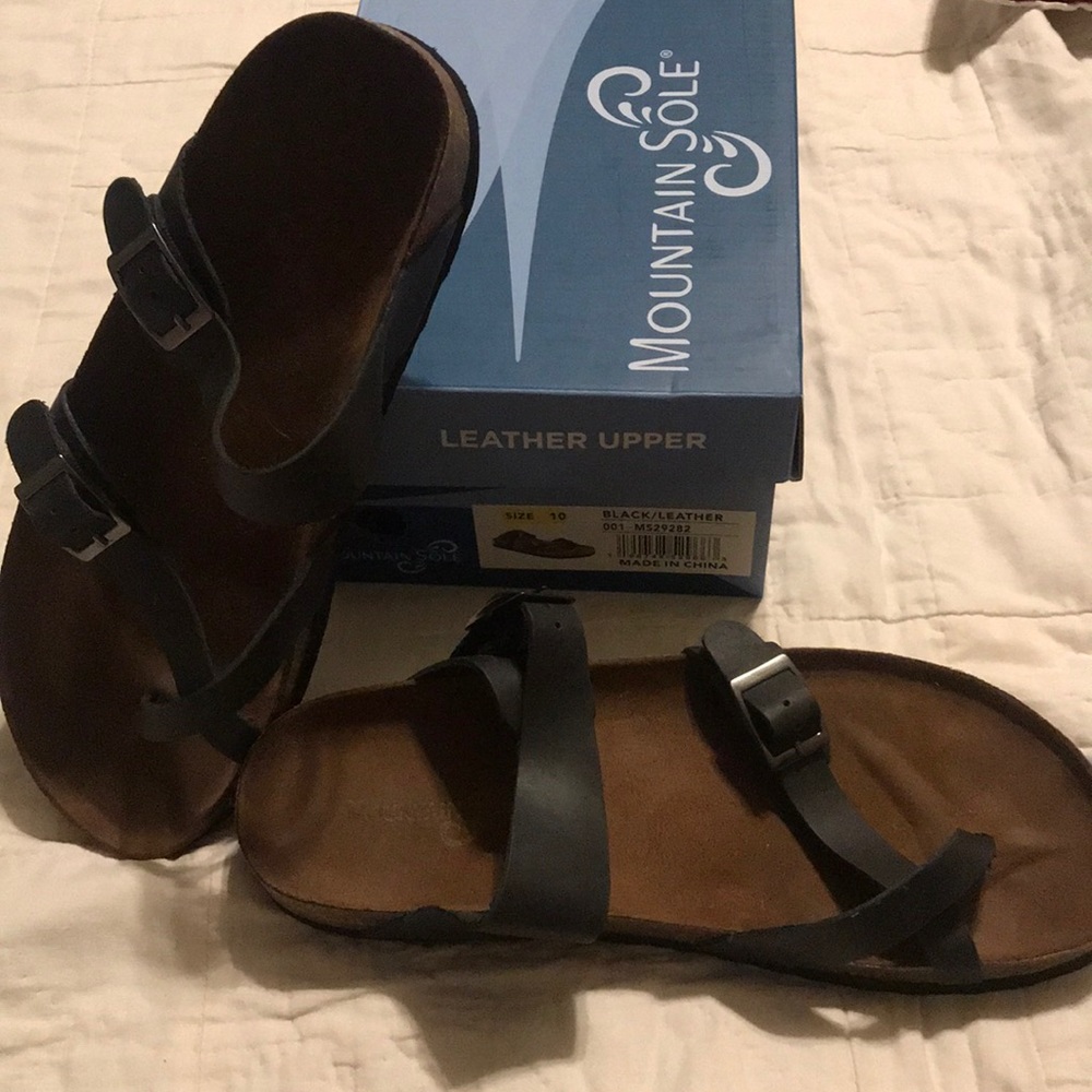 Black “birk” like sandals. Mountain Sole. Size 10